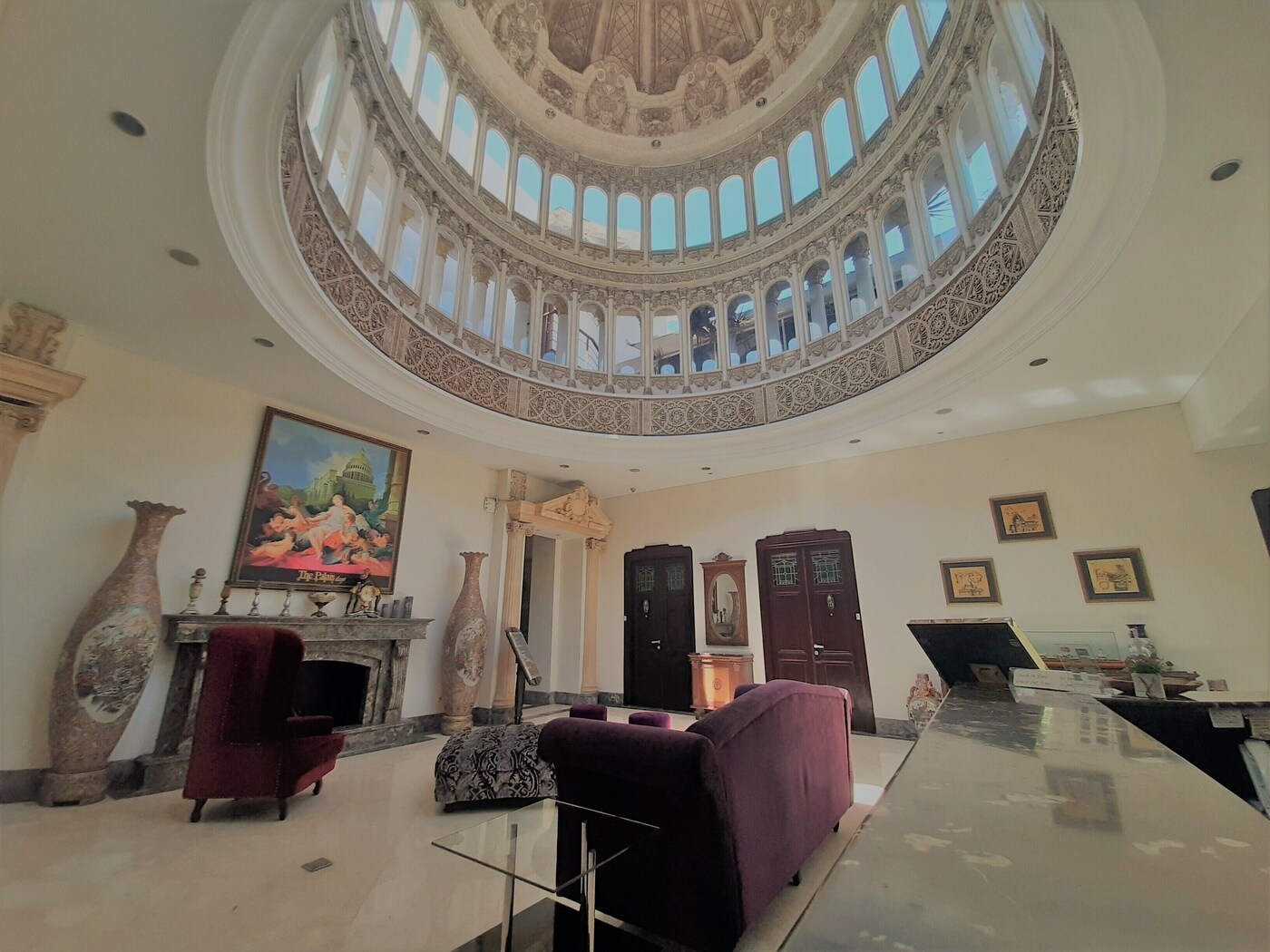 The domed lobby at Palais Dago Hotel